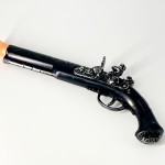 Револьвер пластик длинный серебро Револьвер пластик длинный серебро